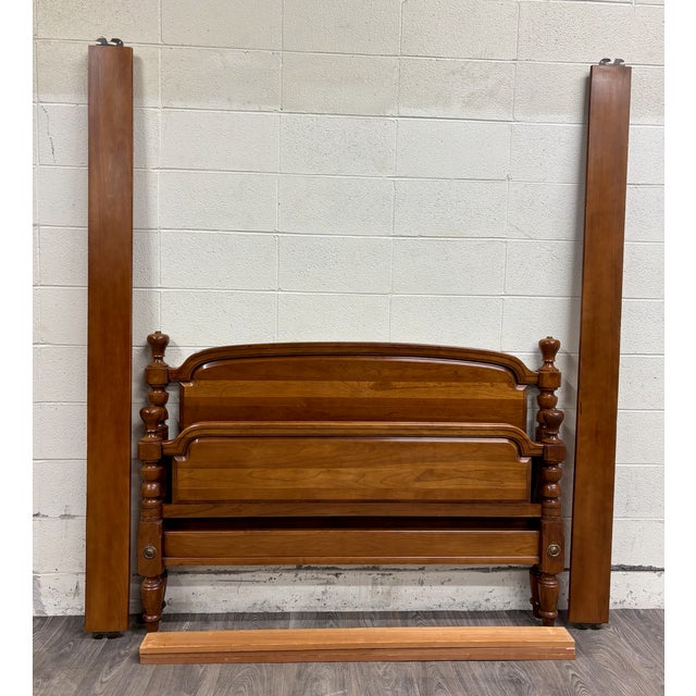 This is a gorgeous vintage Full-Sized Traditional or Colonial style turned low poster bed. Wood appears to be cherry....