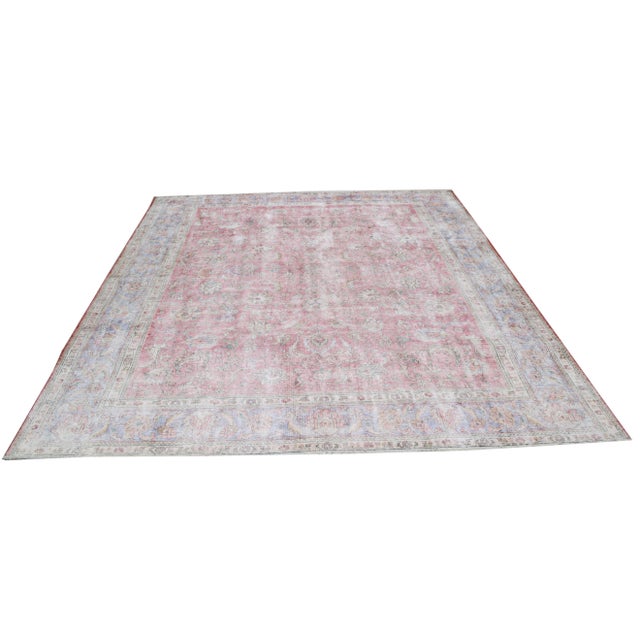 Hand-knotted with care using traditional rug-making techniques, this wool rug blends timeless craftsmanship with a modern...