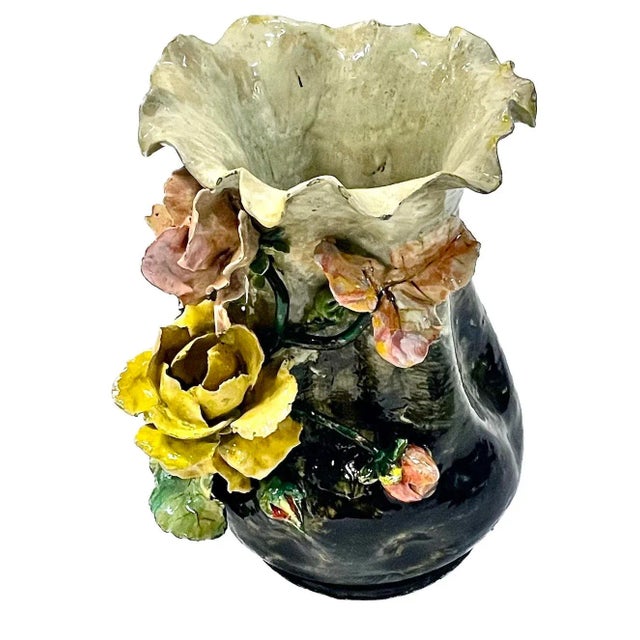 Antique French Barbotine majolica floral cachepot/vase with hole at the underside for drainage. Depicts three dimensional...