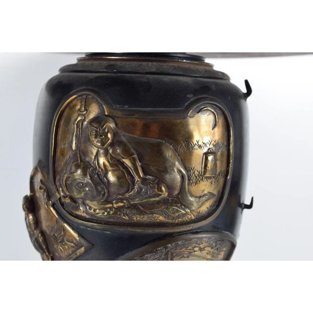 Early 20th Century Chinese Scenic Bronze and Brass Plaque Urn or Lantern-Turned Table For Sale - Image 4 of 13