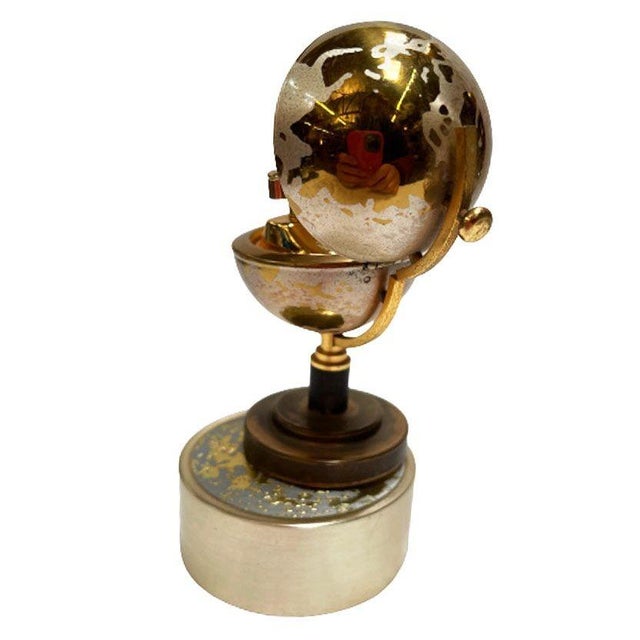 Gold 1960s Mid-Century Brass Spinning Music Box Globe Desktop Table Lighter by Windmill For Sale - Image 8 of 9