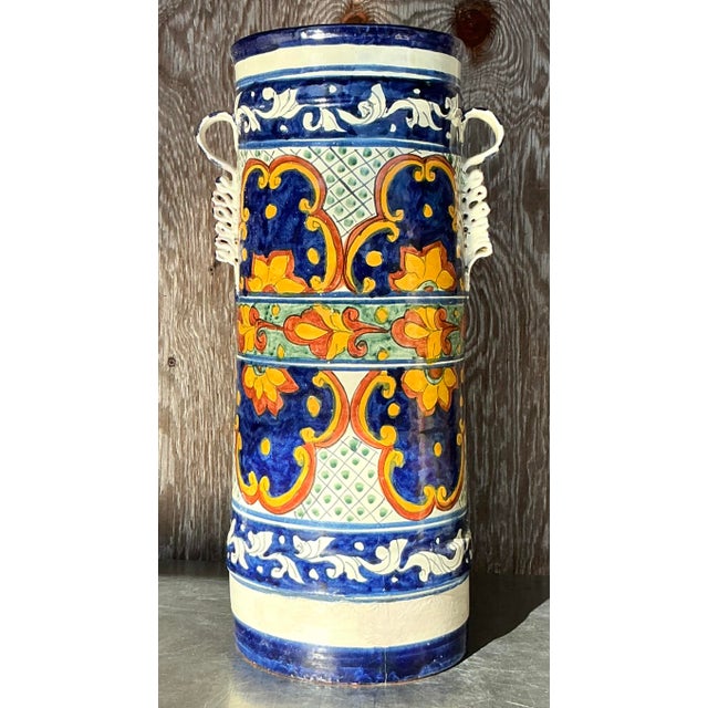 Add a pop of personality to your space with this vintage boho hand-painted umbrella stand. Featuring intricate patterns...