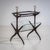 Side table with a removable tray featuring a glass bottom and brass handles. The lower section incorporates angled...