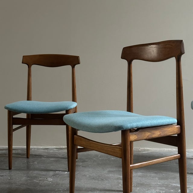 Set of 4 Danish chairs, circa 1960s. The chairs feature an elegant teak frame in typical 1960s Danish style. The seat is...