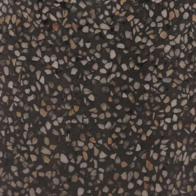 Concrete terrazzo round side table with dark slate gray ground and speckles of browns, beiges, and grays. Perfect for...