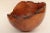 Handmade turned wooden bowl made from California Redwood Burl. A portion of the edge has been enhanced with 24 karat gold...