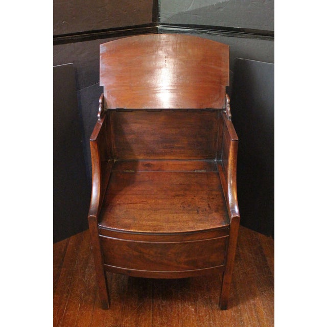 Late 18th century Georgian bedside table commode, English. Pleasing bowfront form raised on square, straight legs. Double...