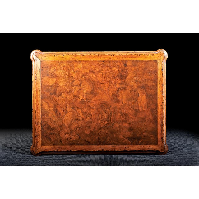 Beautifully handcrafted in Italy, this Country French coffee table is crafted from solid walnut and crowned with a...
