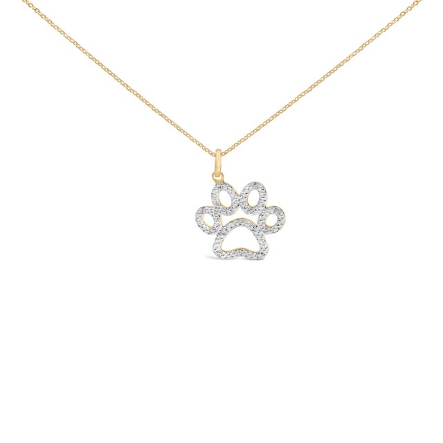 Celebrate the paw prints that forever mark your heart with this luminous keepsake, sculpted as an airy, openwork paw—four...
