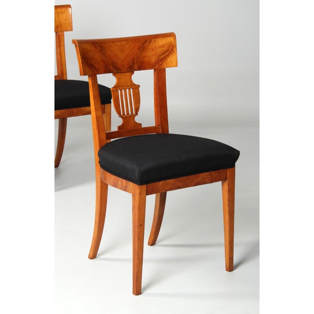 Set of six identical chairs from the Biedermeier period around 1830. H x W x D: 90 x 50 x 43 cm, seat height: 50 cm Made...