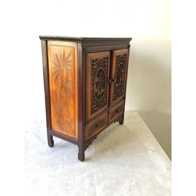 1880s Asian carved wood box with drawers.