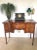 Antique serpentine shaped mahogany sideboard having a quality mahogany serpentine shaped top, bow fronted door to the...