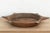 The sculptural form of this vintage bowl takes center stage. Carved from a single piece of solid hardwood, it features a...
