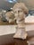 Marble bust depicting aphrodite (venus), the greek goddess of beauty and love. Carved from white marble, it features a...