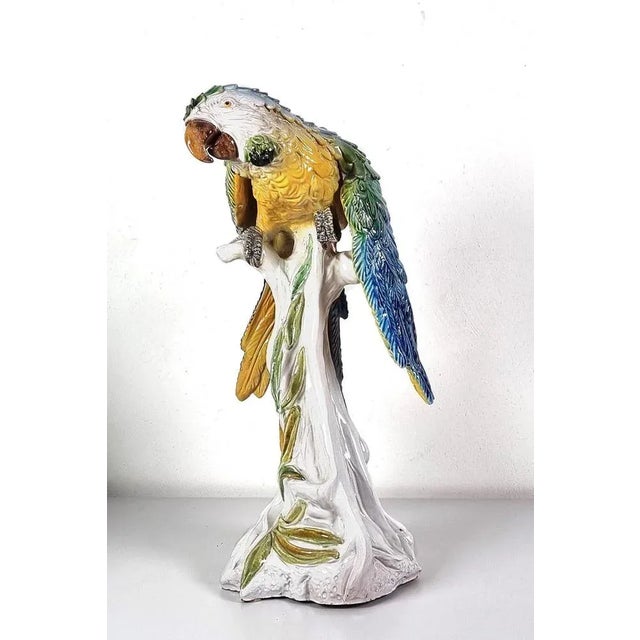 Fantastic set of 2 ceramic macaws. There is a small chip in the nail of one of the figurines. In good vintage condition....