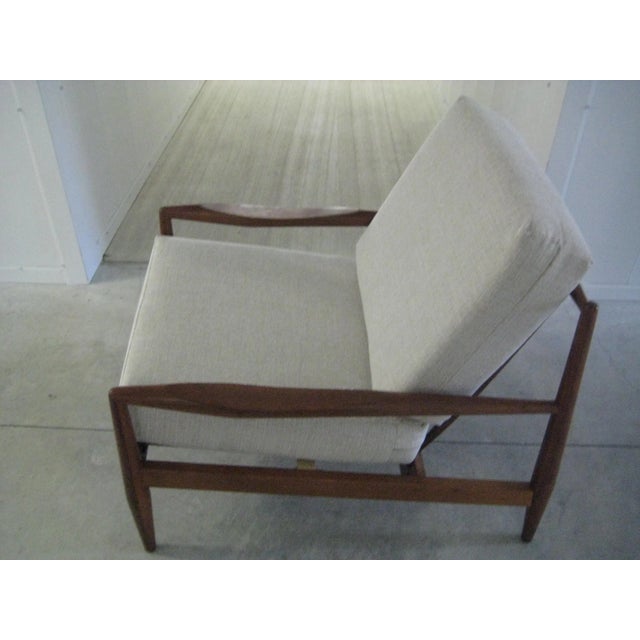 Midcentury 1960s Adrian Pearsall 843C model Lounge chair. Walnut chair has five spindle back supports and beautiful...