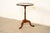 A gorgeous Georgian or Chippendale style pedestal drinks table, side table, or tea table By Imperial Furniture Company of...