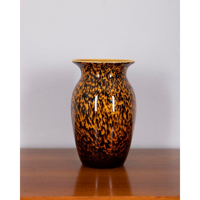 Murano blown glass vase with amber, orange and black spotted patterns, 1960s.