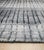 This gray contemporary rug features a hand knotted pile construction made from a blend of wool and viscose. Crafted in...
