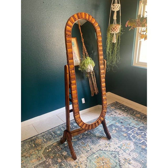 Fun boho decor piece! Gorgeous craftsmanship of handcut bamboo & rattan pieces artfully designed into this oval, full...
