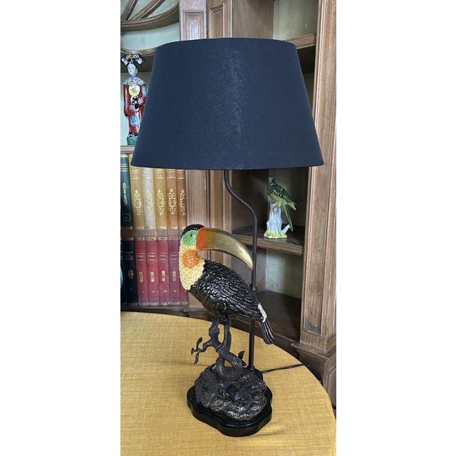 Porcelain and Bronze Toucan Lamp with Oval Right Lampshade by Gand & C, in New conditions. Designed from 2000 Stamped by...