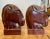 This striking pair of vintage wooden horse head bookends offers a bold and sculptural presence, with a form that borders...