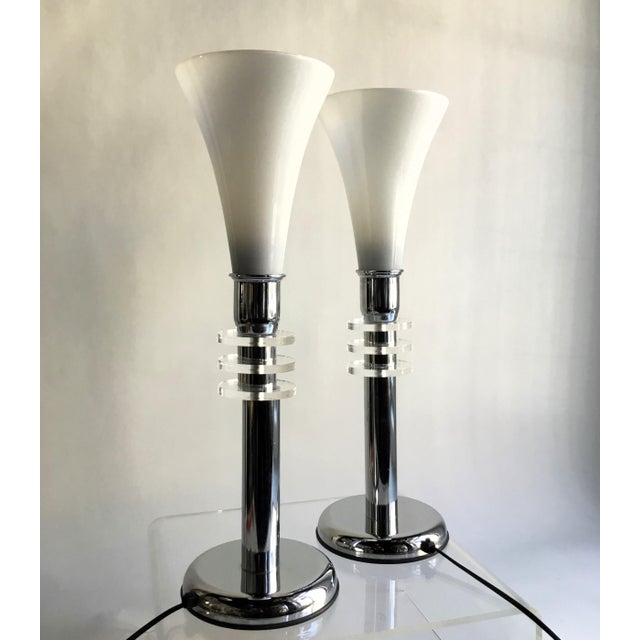 Pair of Art Deco Style table lamps, Germany 1980s, Chrome-plated base, acrylic glass discs and white opaline glass shades....