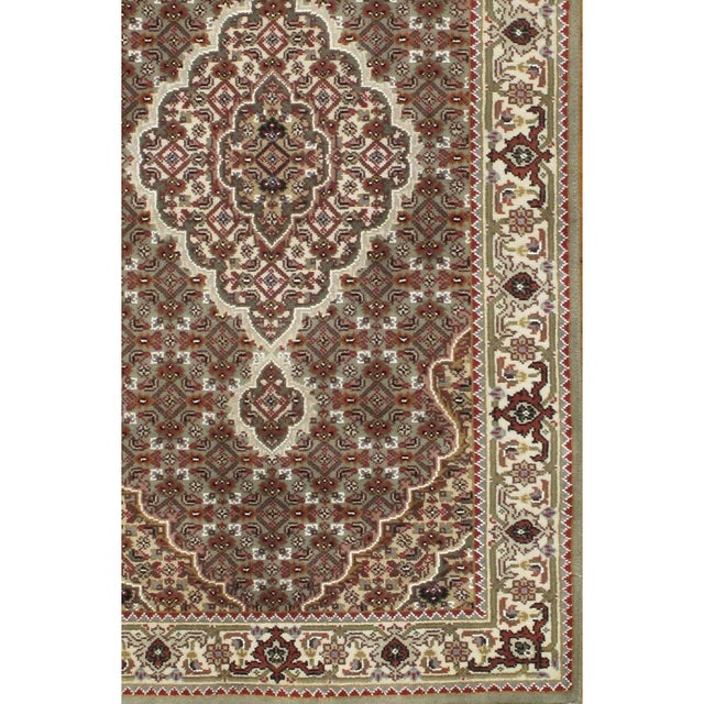 Fine Tabriz Fish Design rug. Handmade and hand-knotted Silk & Wool Pile on a Cotton Foundation this rug has a dense, soft...