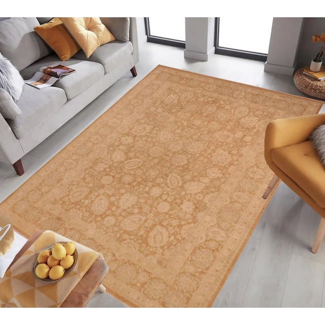 A Persian influenced Turkish hand knotted rug made by skilled artisans capable of creating the most exceptional vegetable...