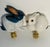 Gorgeous pair of vintage porcelain rabbit figurines mounted on a brass bases as lamp finials.
