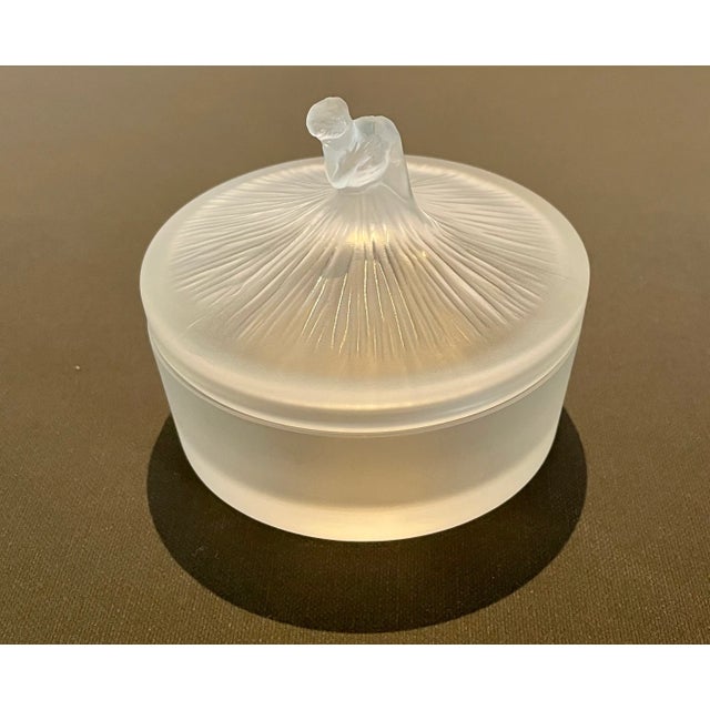 Originally designed in 1918 by Rene' Lalique - this "powder box" was an homage to his friend Edgar Degas. A delicate...