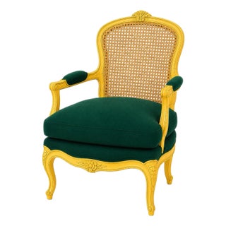 Mid 20th Century French Louis XV Caned Bergère Armchair — Canary Yellow Frame With Emerald Green Cushion Cover For Sale