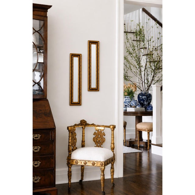 Elegant faux bamboo accent mirrors featuring beautifully detailed wood frames with a rich gold gilt finish. Crafted in the...
