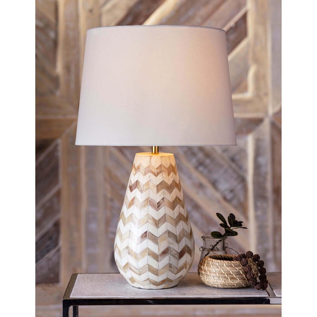 Pattern play: The complex inlayed bone pattern is hand made but at the same time so chic. This boho style lamp makes an...