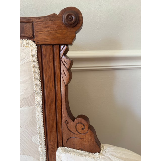 Cream Antique Victorian Eastlake Walnut Settee/Loveseat - Reupholstered For Sale - Image 8 of 9