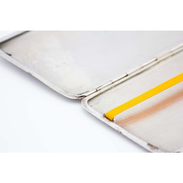 Rectangular Silver Cigarette Case with Crimped Top Bands and Hinged Lid, in Very Good conditions. Designed 1890 to 1919...