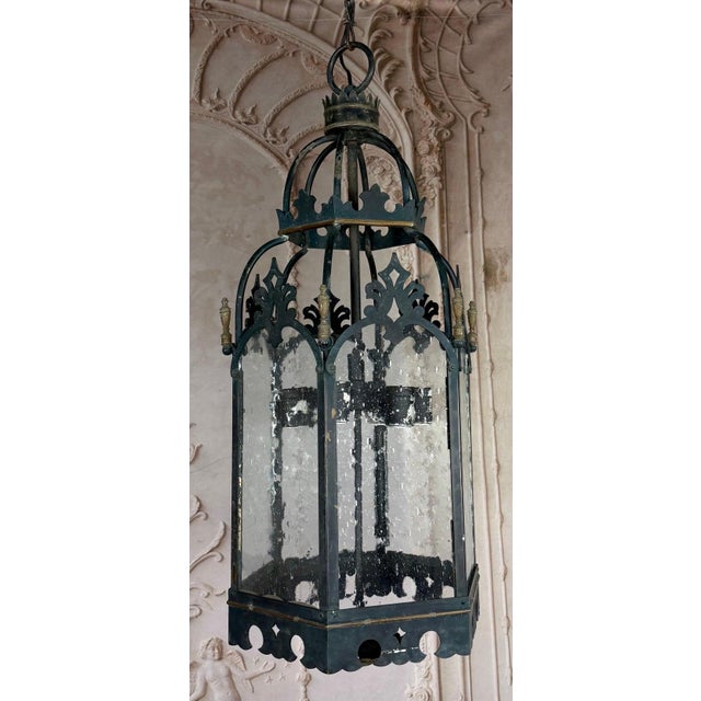 A magnificent and monumental Gothic Revival hall lantern, exuding Old World romance and architectural grandeur. This...