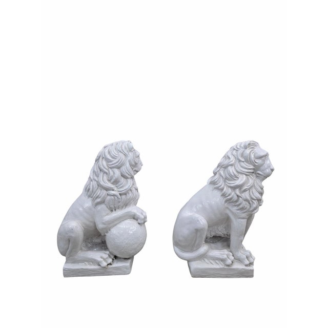Vintage Neoclassical Style Heraldic Lion Sculptures with Sphere & Shield – Set of 2 Decorative pair of neoclassical-style...