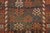 Hand-knotted in wool and originating circa 1900-1919, this 4x6 antique Persian rug features an allover field of repeating...