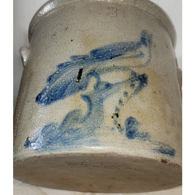 19thc Stoneware decorated crock with bird and handles.This three gallon crock is unsigned probably New York State.The...