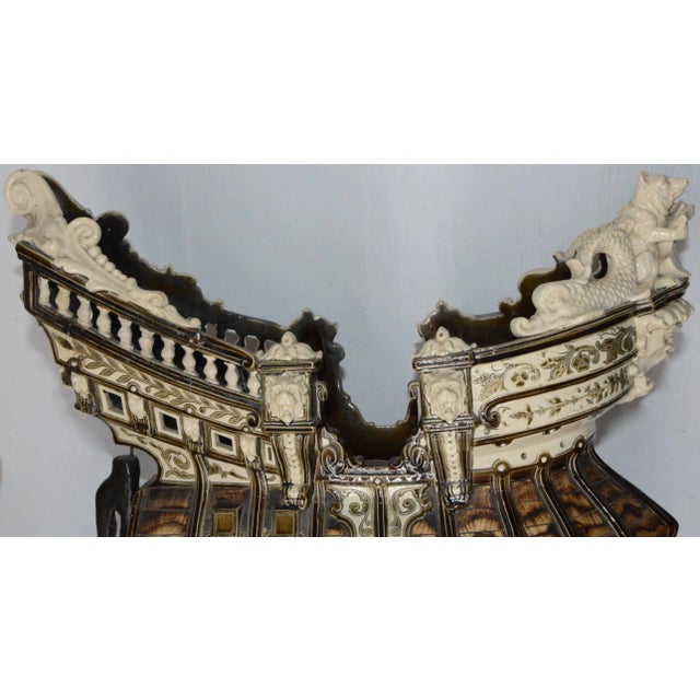 We are offering a fabulous Majolica ship that has a variety of animals placed on the piece. The rudder is moveable and is...