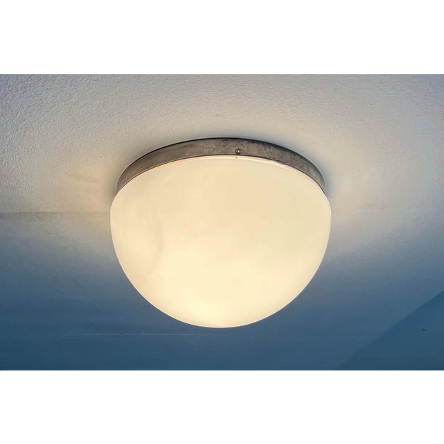 Mid-century ceiling light from Finland. The manufacturer is unfortunately unknown, but it is reminiscent of the functional...