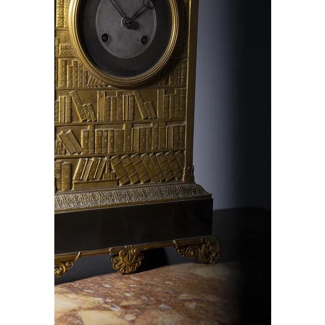 French Louis XIV Gilt Bronze Figured Clock with Library Design For Sale - Image 11 of 12