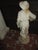French Vintage 17th Century Style French Plaster Statue of Boy With Flower For Sale - Image 3 of 4