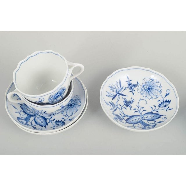 Meissen Blue Onion pattern – three coffee cups with matching saucers. Set of three Meissen coffee cups with matching...