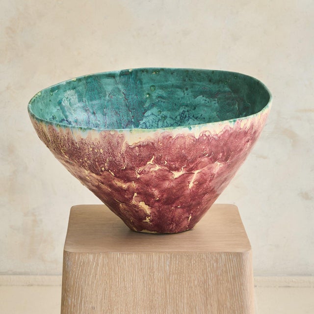 An Italian handmade ceramic bowl dating to the mid-20th century. Generous in scale, the form opens into a wide, gently...
