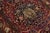 1900 - 1909 Antique Kerman Persian Red Wool Rug With a Rosette Motif For Sale - Image 5 of 7