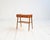Scandinavian-made teak bedside table with a front drawer and a lower shelf in woven cane. 1950s. A Scandinavian bedside...