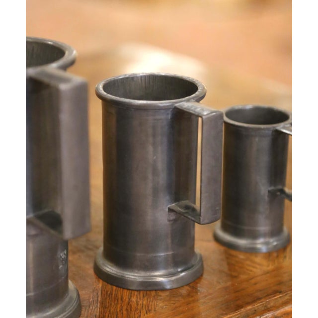 Late 20th Century Late 20th Century French Graduated Pewter Measures With Handles, Set of 7 For Sale - Image 5 of 11