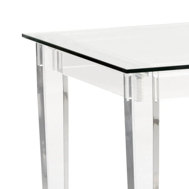 Acrylic desk with nickel accents and a tempered glass top.
